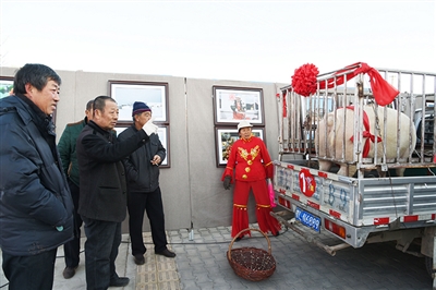 杭后第二届民间年猪文化节真红火